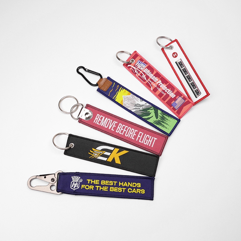 Bakit Isang Napakahusay na Pagpipilian para sa Modernong Promosyon ng Brand ang Custom Embroidered Fabric Keychain na May Snap Hook